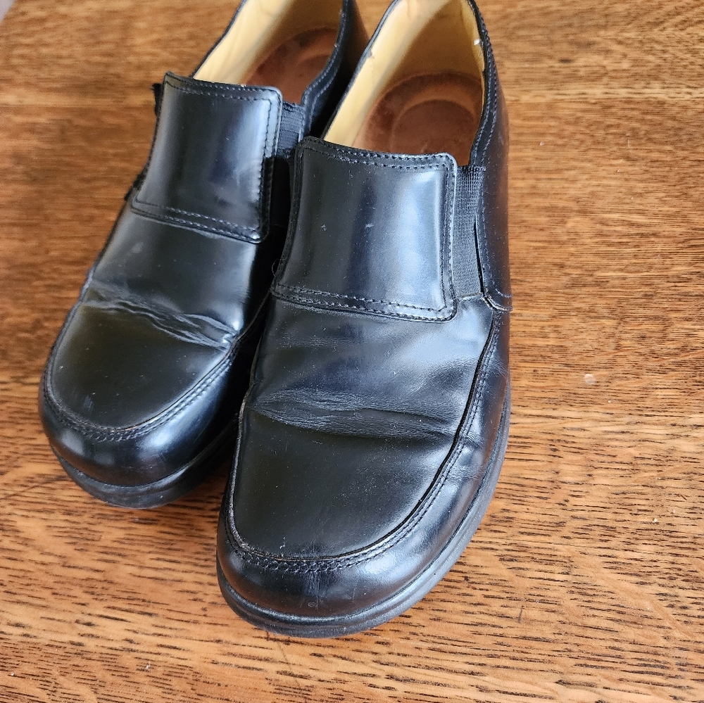 Black leather loafers